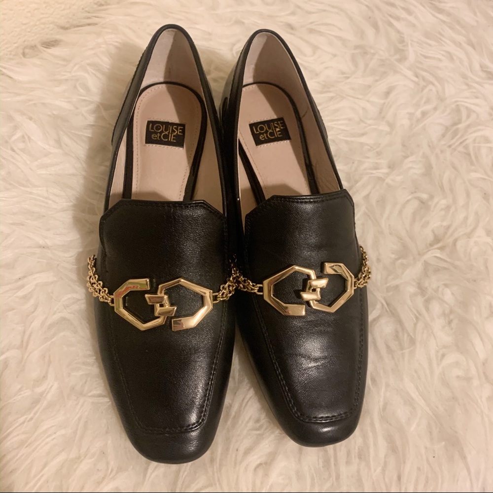 Black Leather Loafers With Gold Chain Detail.